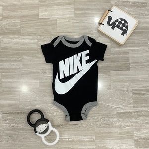 Nike black and white baby bodysuit
